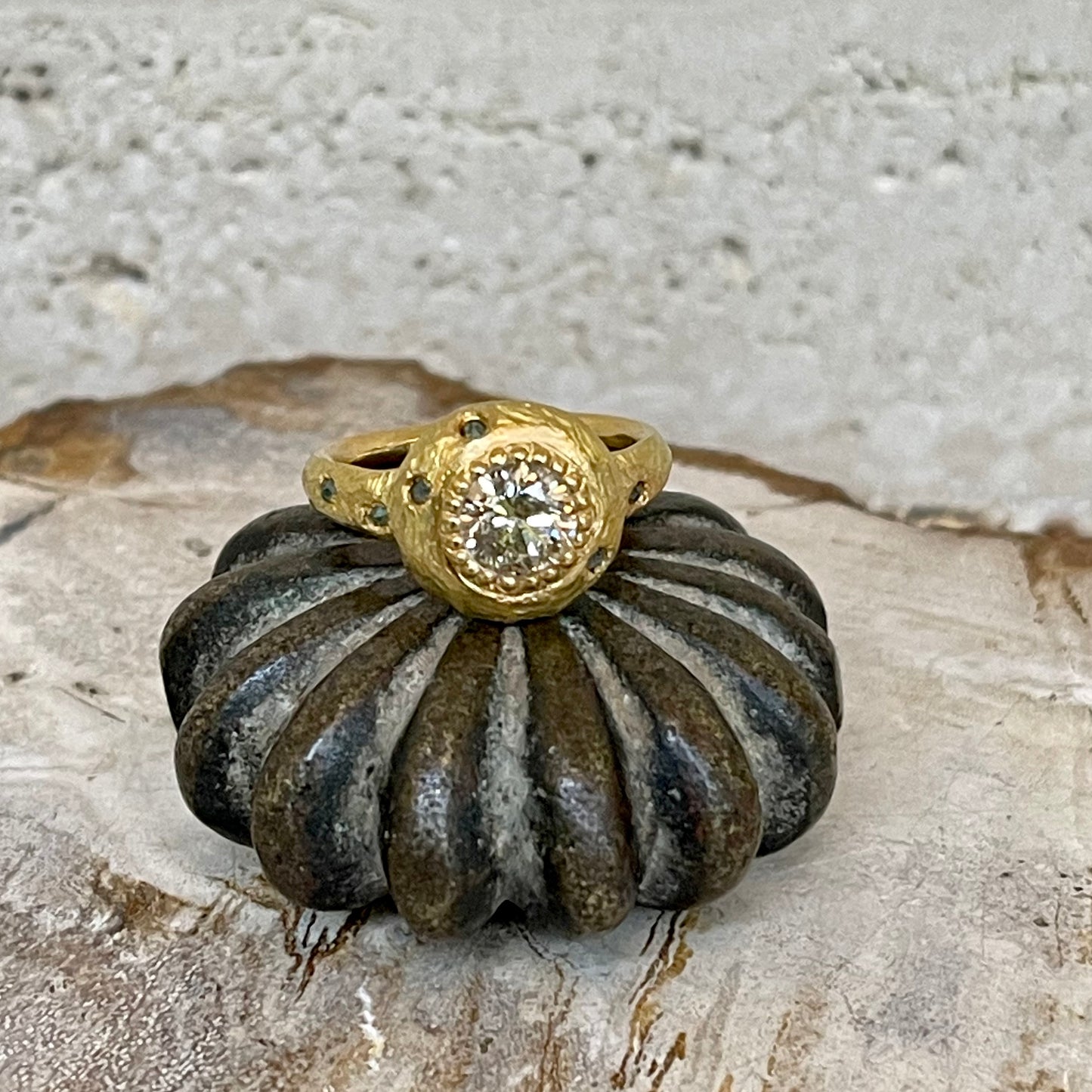 Champagne and green diamond ring