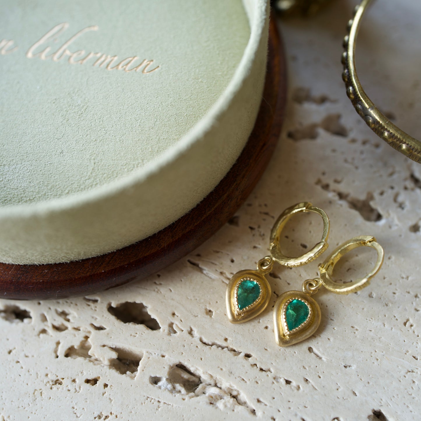 Pear emerald hoop earrings