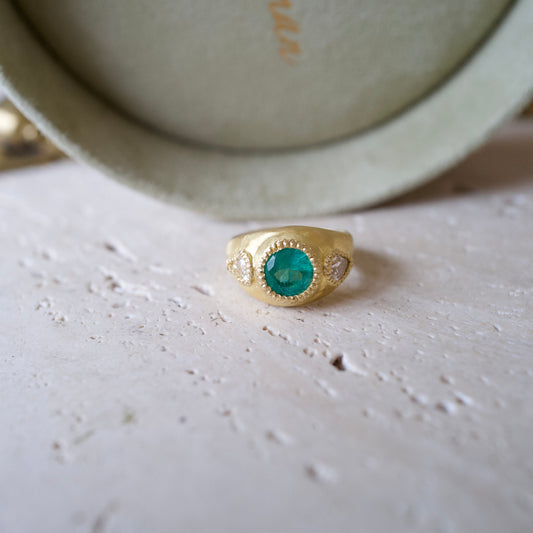 Emerald and pear diamond ring