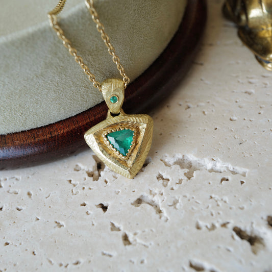 Trillion cut emerald pendant necklace