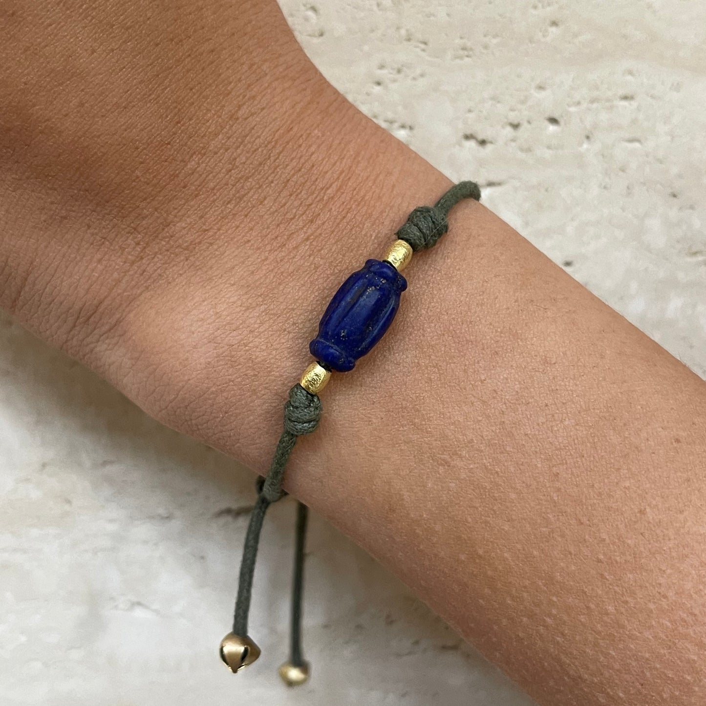 Lapis and gold bead cord bracelet