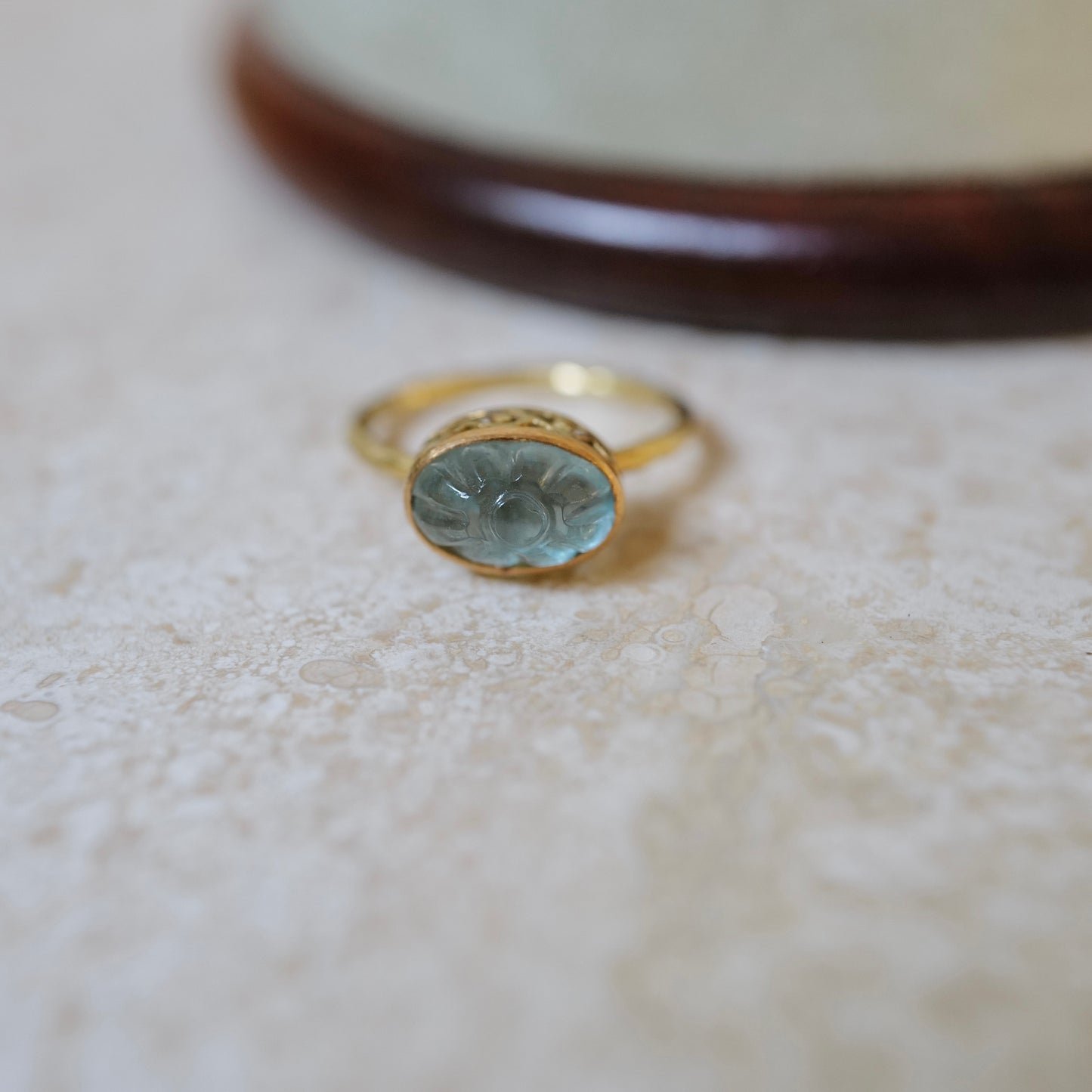 Carved flower aquamarine ring