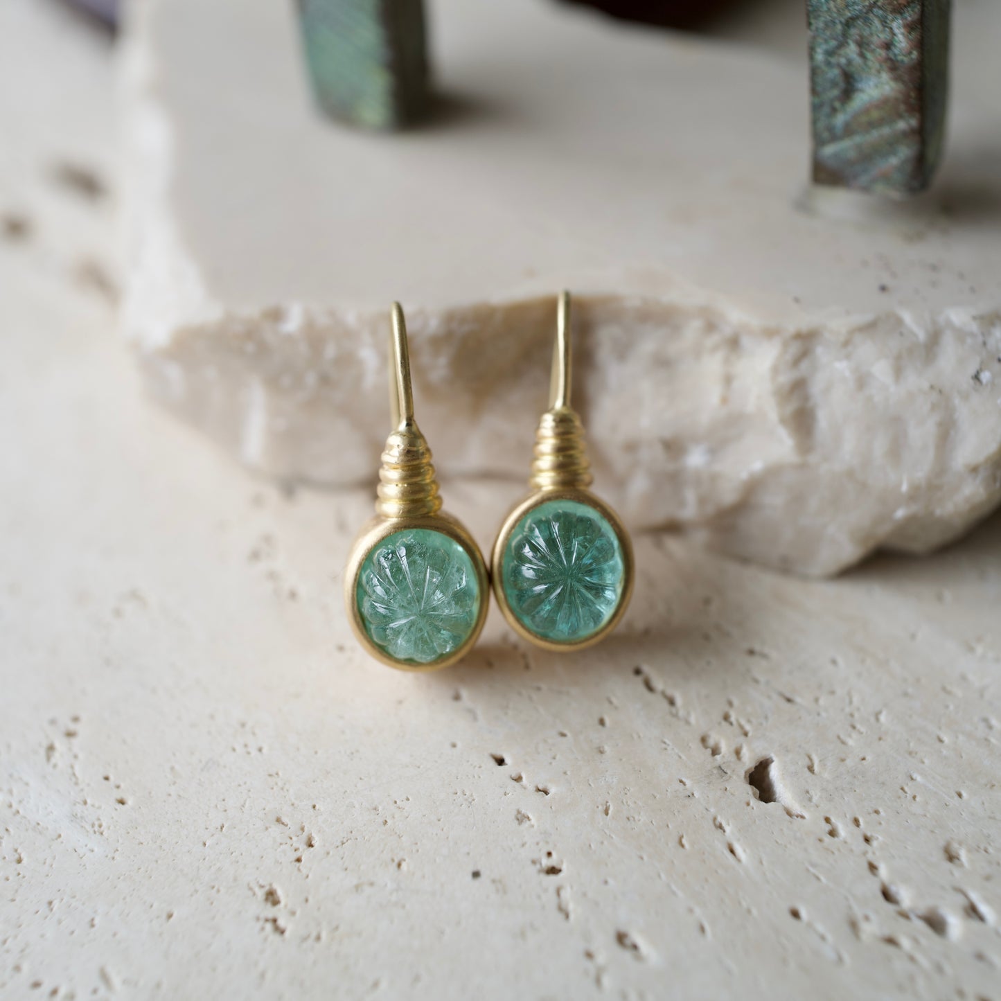 Carved emerald earrings