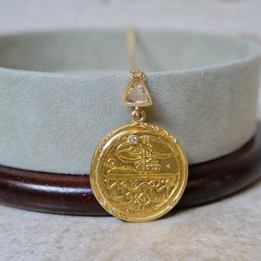 Antique gold coin and diamond pendant necklace