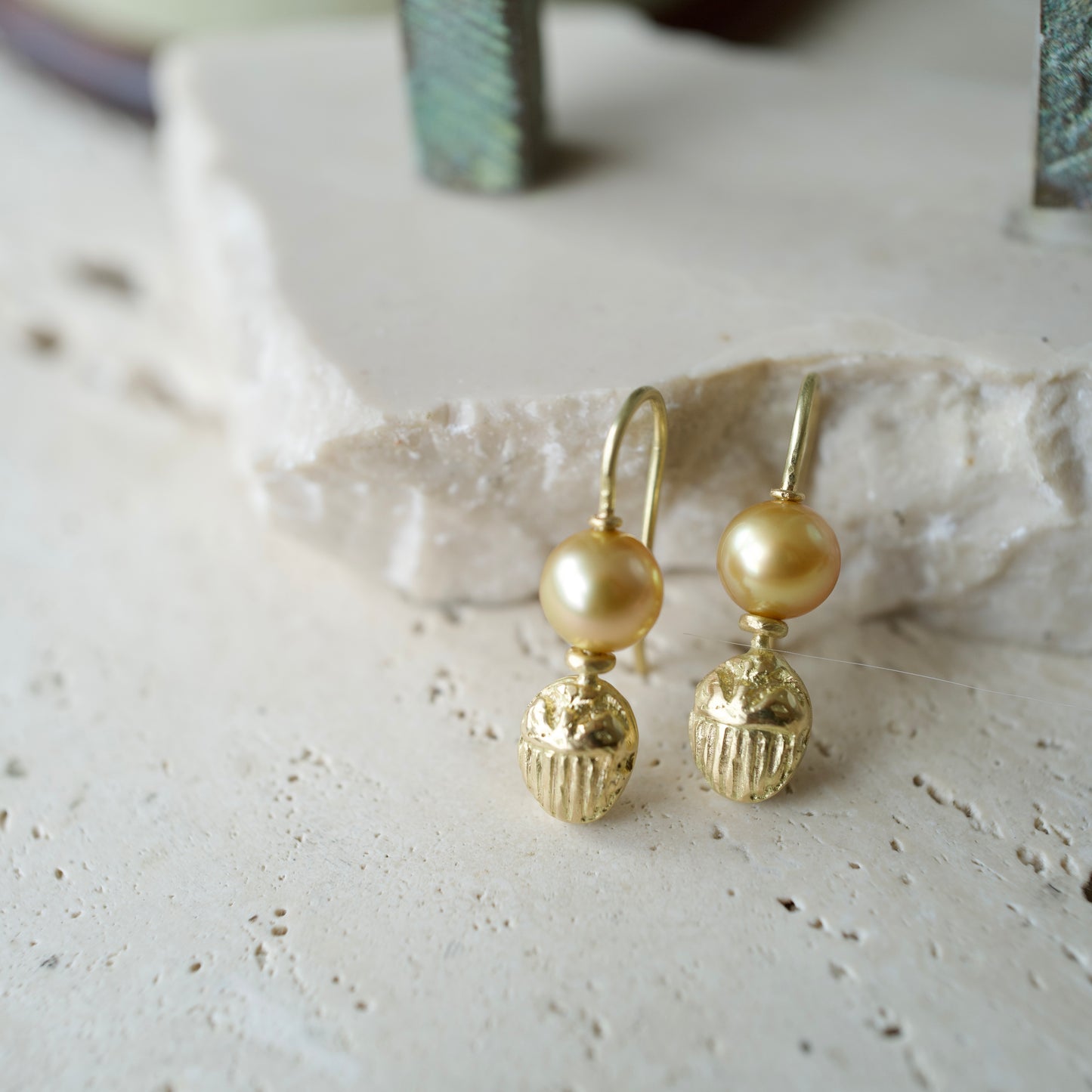 Pearl scarab earrings