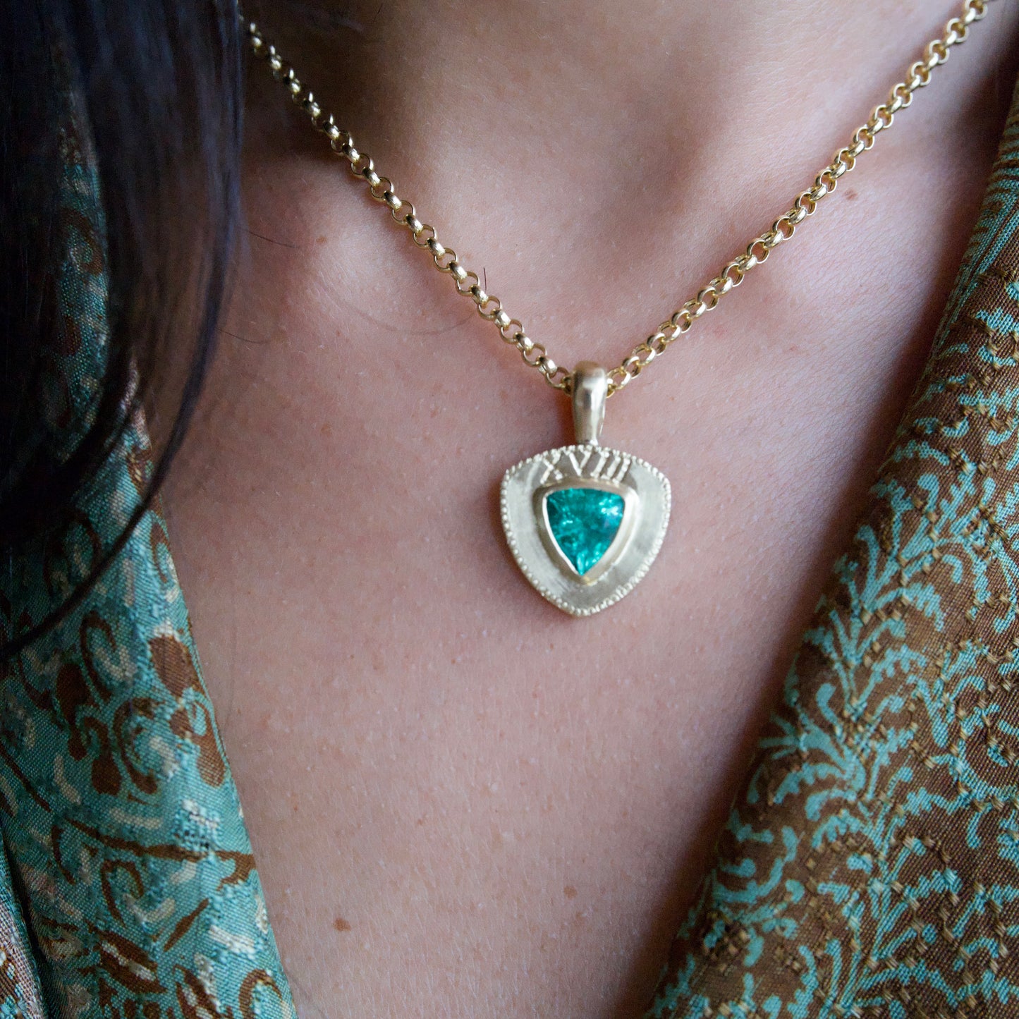 Trillion cut emerald pendant